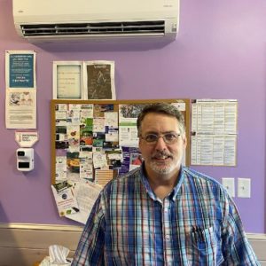 Raymond Higby of Complete Care Chiropractic in Lowville, New York with a newly installed heat pump